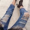 RIPPED BOYFRIEND JEANS