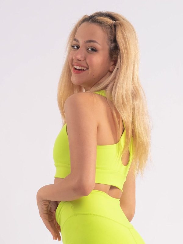 Elen Fluo yellow Αθλητικό μπουστάκι με χιαστί πλάτη και φάσα κάτω από το στήθος για σταθερή εφαρμογή.