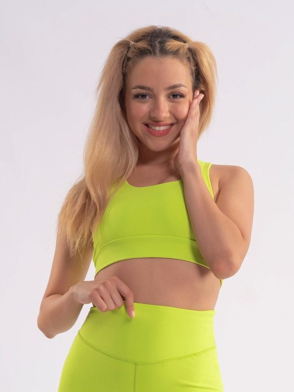 Elen Fluo yellow Αθλητικό μπουστάκι με χιαστί πλάτη και φάσα κάτω από το στήθος για σταθερή εφαρμογή.