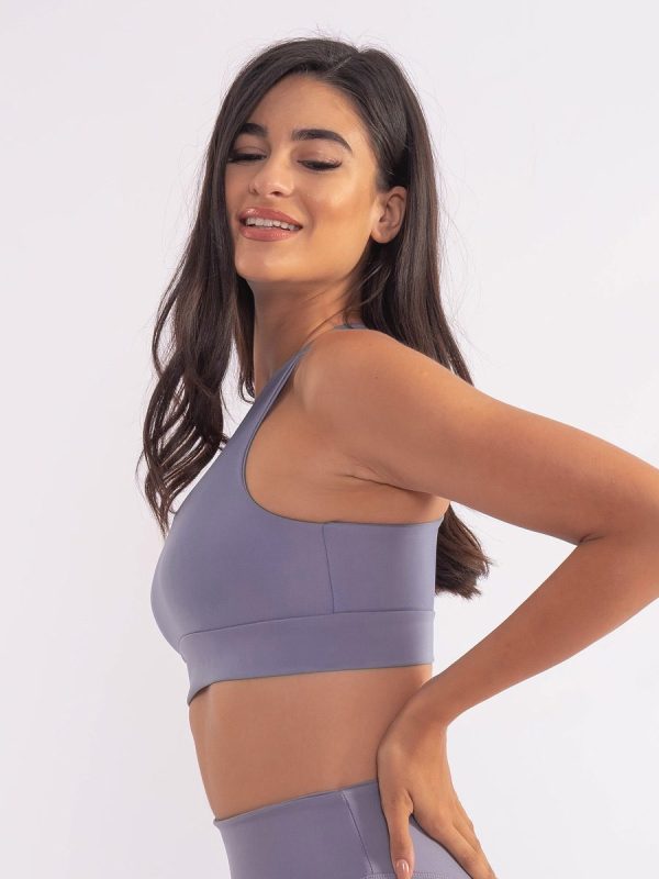 Elen water blue Αθλητικό μπουστάκι με χιαστί πλάτη και φάσα κάτω από το στήθος για σταθερή εφαρμογή.